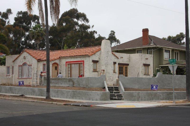 Can you apply stucco over a block or brick wall without applying a cement plaster base coat?